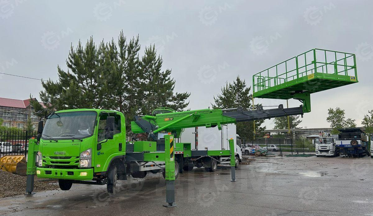 Isuzu Elf - Грузовик с подъемником: фото 1 Isuzu Elf - Грузовик с подъемником: фото 1