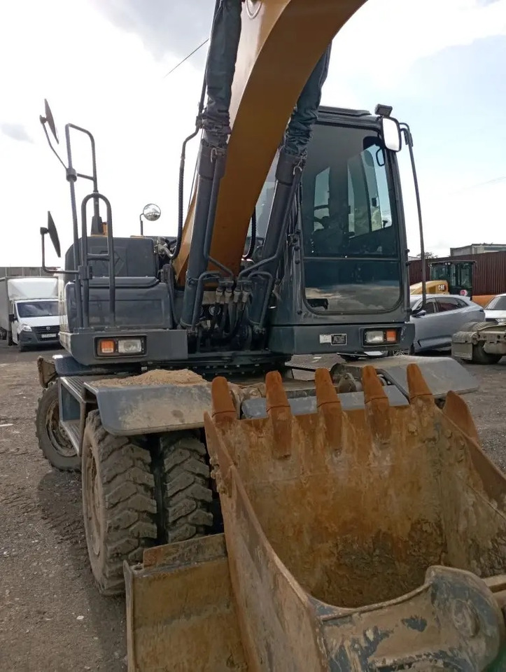 XCMG XE180WD - Колёсный экскаватор: фото 1 XCMG XE180WD - Колёсный экскаватор: фото 1