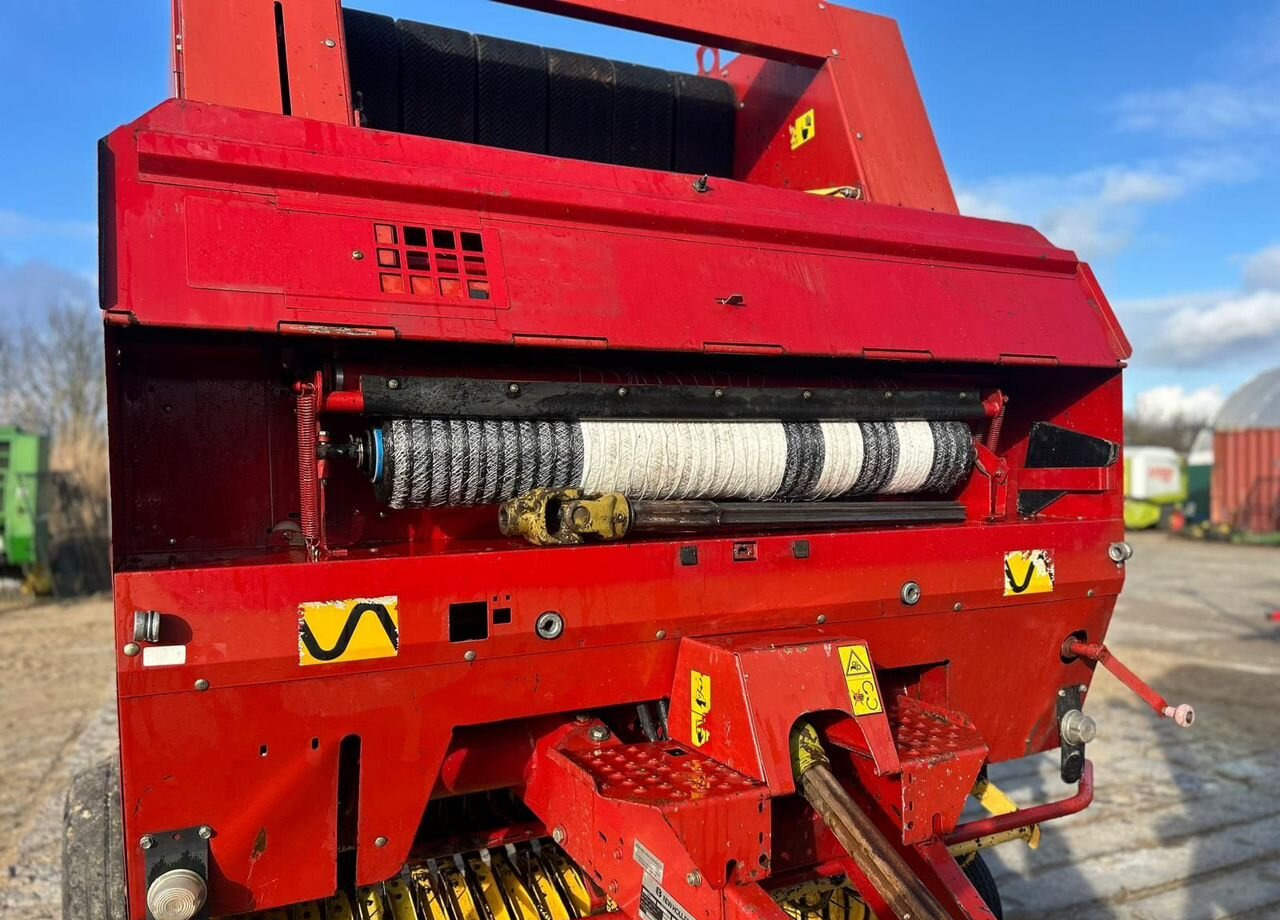 New Holland 658 - Пресс-подборщик рулонный: фото 1 New Holland 658 - Пресс-подборщик рулонный: фото 1