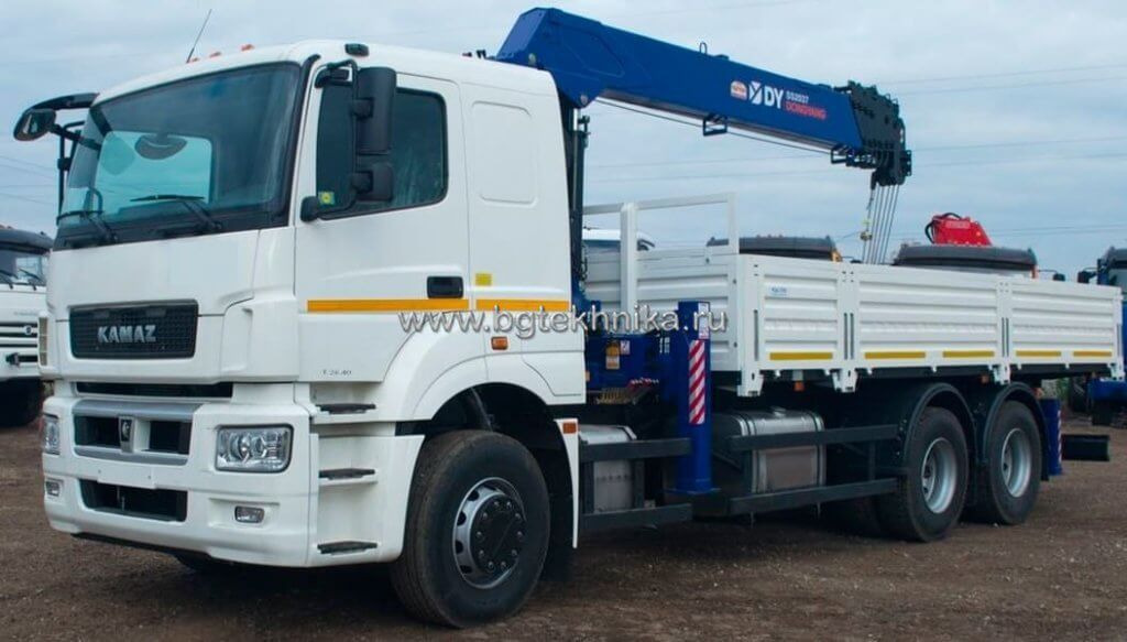 Бортовой КАМАЗ 65207 с КМУ DongYang SS2037 - Бортовой грузовик/ Платформа, Автоманипулятор: фото 1 Бортовой КАМАЗ 65207 с КМУ DongYang SS2037 - Бортовой грузовик/ Платформа, Автоманипулятор: фото 1