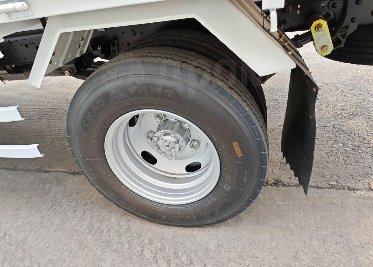 Isuzu Elf - Бортовой грузовик/ Платформа: фото 4 Isuzu Elf - Бортовой грузовик/ Платформа: фото 4