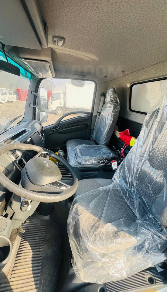 Новый Изотермический грузовик Isuzu Elf: фото 12 Новый Изотермический грузовик Isuzu Elf: фото 12