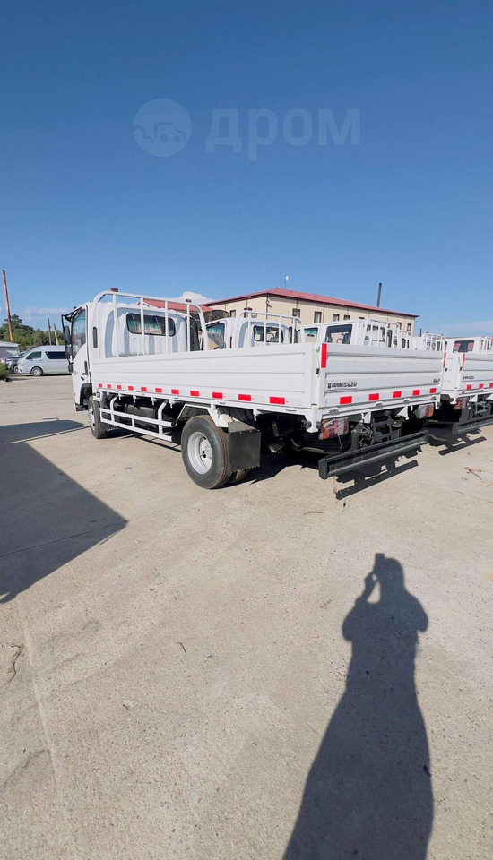 Isuzu KV100 - Бортовой грузовик/ Платформа: фото 4 Isuzu KV100 - Бортовой грузовик/ Платформа: фото 4