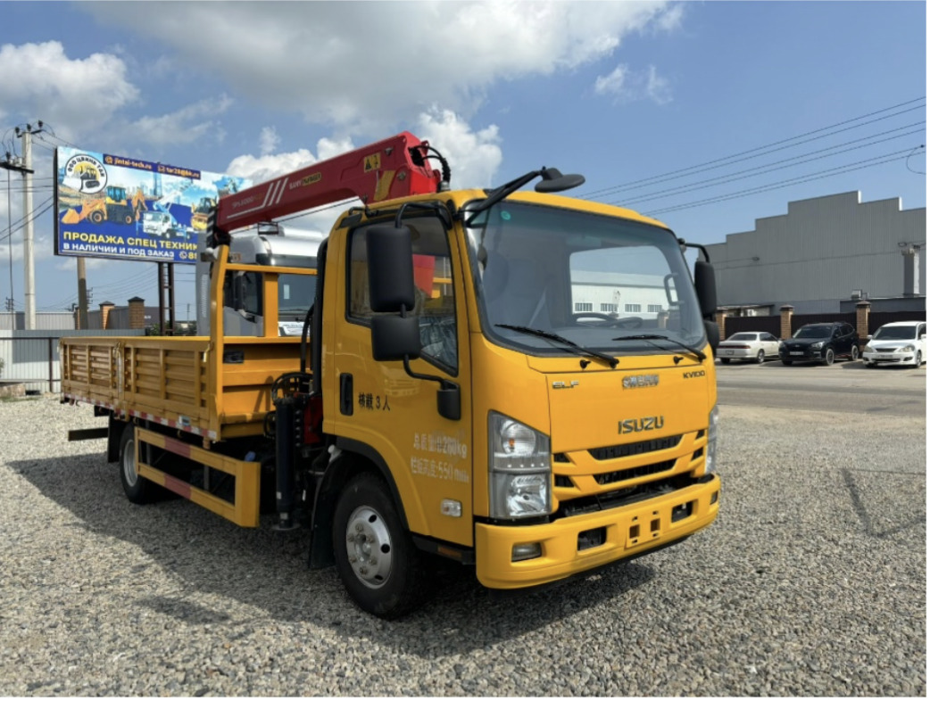 ISUZU ELF KV100 - Бортовой грузовик/ Платформа: фото 1 ISUZU ELF KV100 - Бортовой грузовик/ Платформа: фото 1