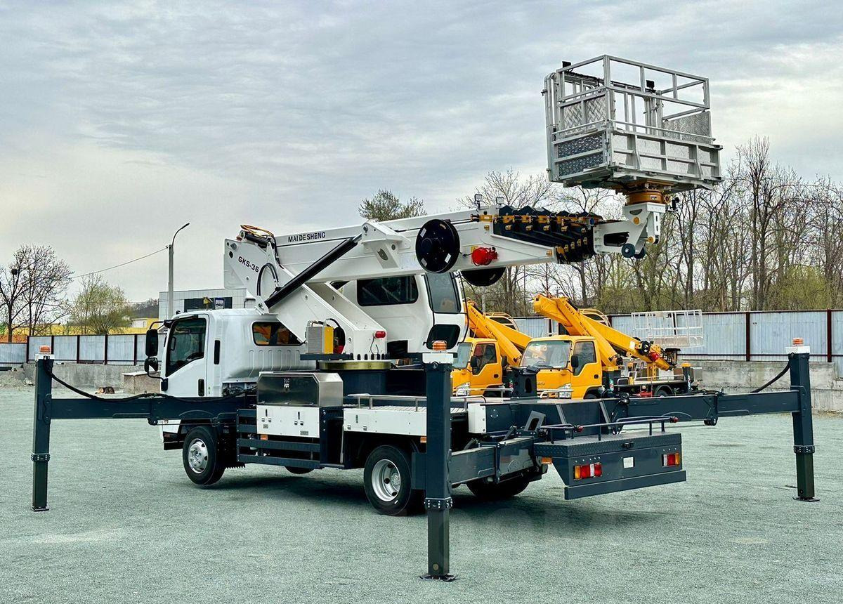 Isuzu Elf - Автовышка: фото 3 Isuzu Elf - Автовышка: фото 3