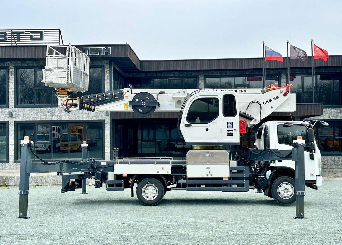 Isuzu Elf - Автовышка: фото 1 Isuzu Elf - Автовышка: фото 1