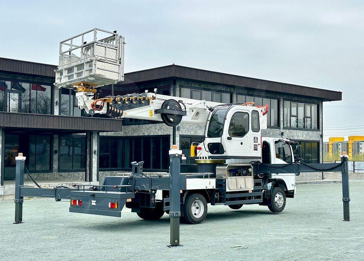 Isuzu Elf - Автовышка: фото 5 Isuzu Elf - Автовышка: фото 5