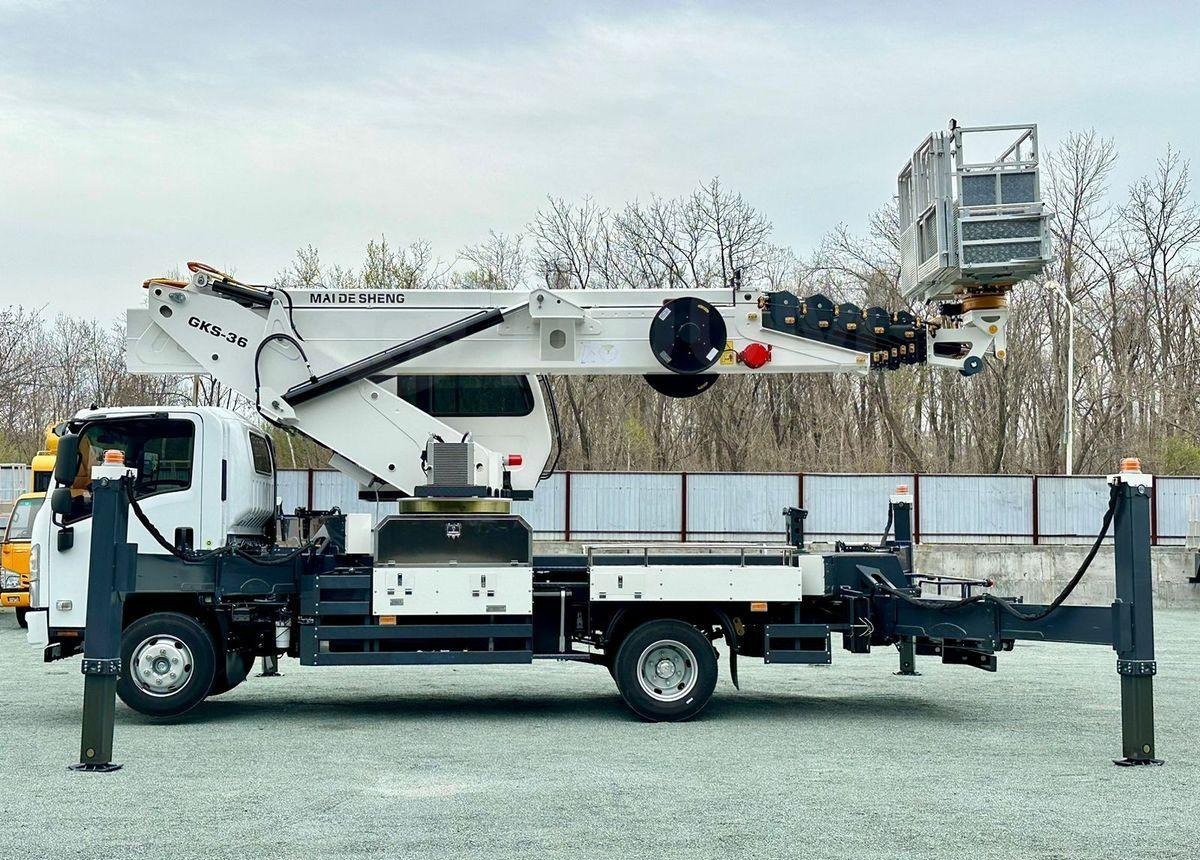 Isuzu Elf - Автовышка: фото 2 Isuzu Elf - Автовышка: фото 2