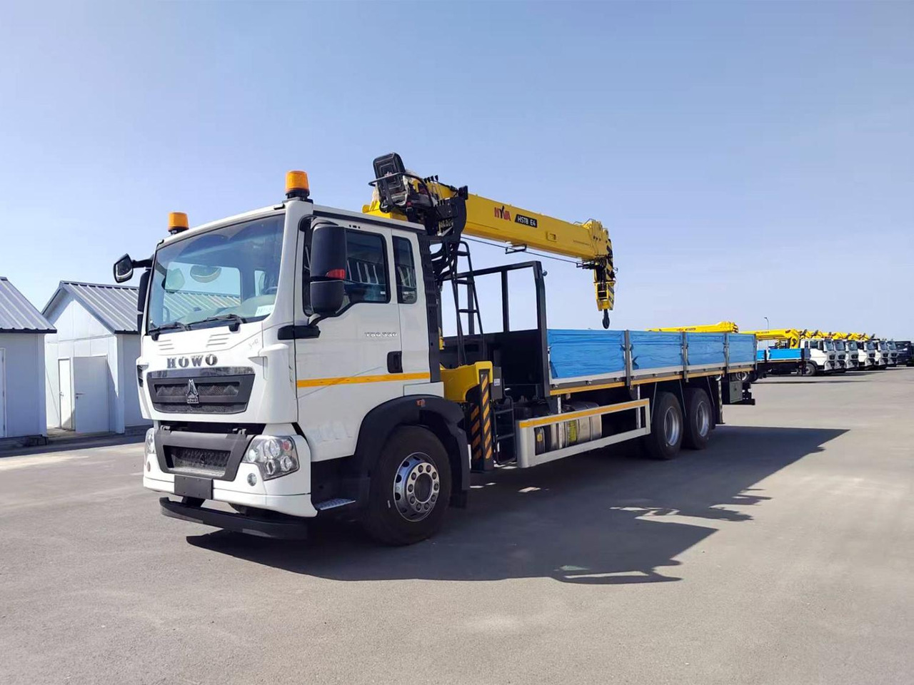 Краноманипуляторная установка HYVA на шасси HOWO T5G 6x4 8 тонн - Автоманипулятор: фото 5 Краноманипуляторная установка HYVA на шасси HOWO T5G 6x4 8 тонн - Автоманипулятор: фото 5