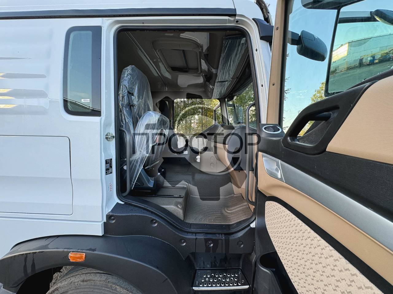 Новый Тентованный грузовик HOWO Sinotruk Howo T5G Европлатформа шторная: фото 21 Новый Тентованный грузовик HOWO Sinotruk Howo T5G Европлатформа шторная: фото 21
