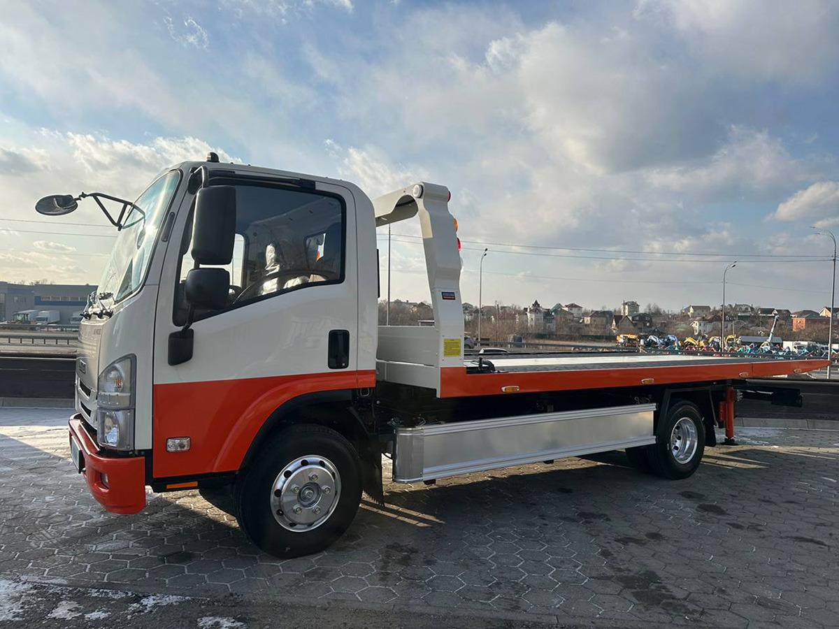Эвакуаторная платформа 4.5 т на шасси Isuzu Elf - Эвакуатор: фото 4 Эвакуаторная платформа 4.5 т на шасси Isuzu Elf - Эвакуатор: фото 4