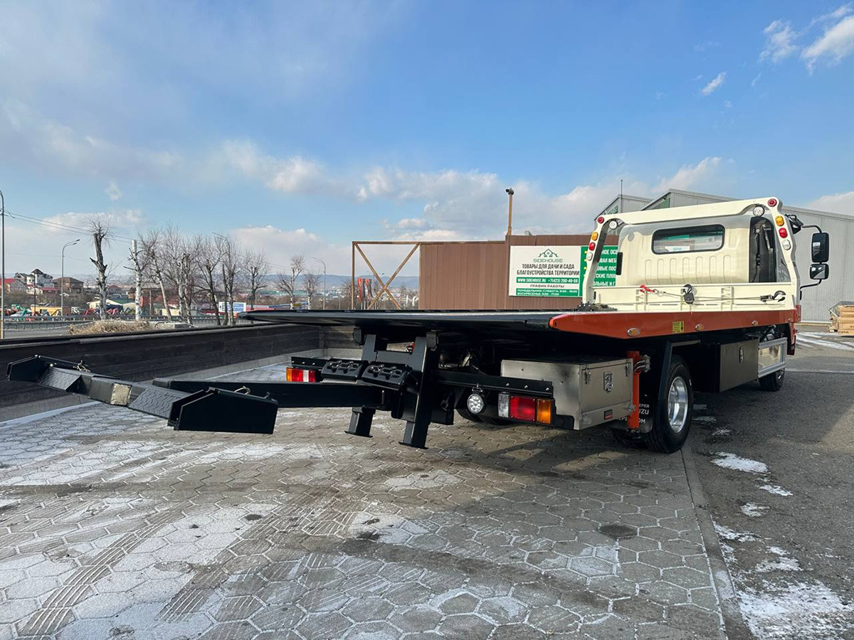 Эвакуатор Эвакуаторная платформа 4.5 т на шасси Isuzu Elf: фото 16 Эвакуатор Эвакуаторная платформа 4.5 т на шасси Isuzu Elf: фото 16