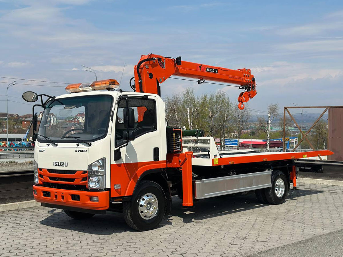Эвакуаторная платформа 4.5 т с КМУ 3.2 т на шасси Isuzu Elf - Эвакуатор: фото 5 Эвакуаторная платформа 4.5 т с КМУ 3.2 т на шасси Isuzu Elf - Эвакуатор: фото 5