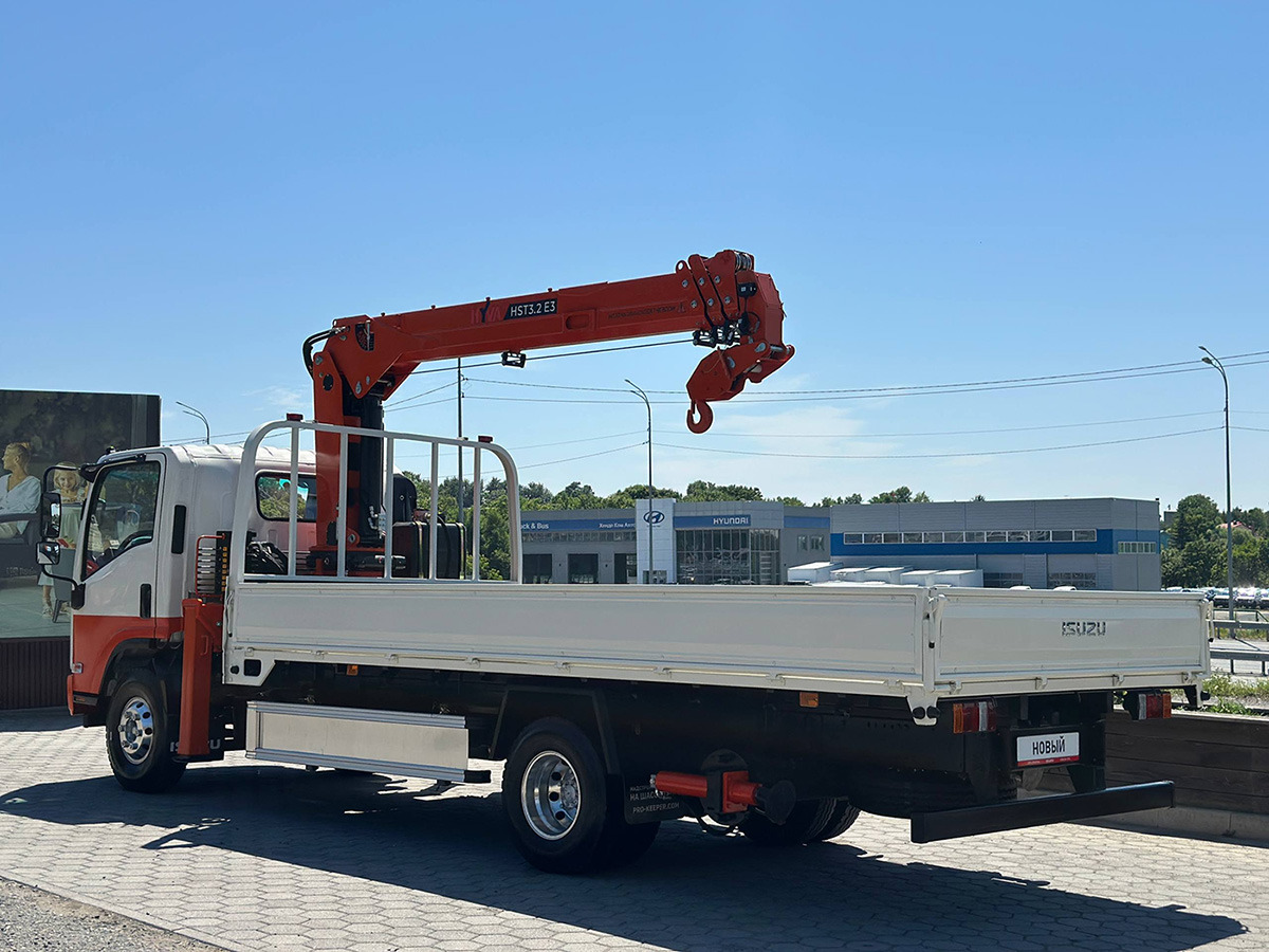 ISUZU ELF бортовой с КМУ HYVA - Бортовой грузовик/ Платформа, Автоманипулятор: фото 4 ISUZU ELF бортовой с КМУ HYVA - Бортовой грузовик/ Платформа, Автоманипулятор: фото 4