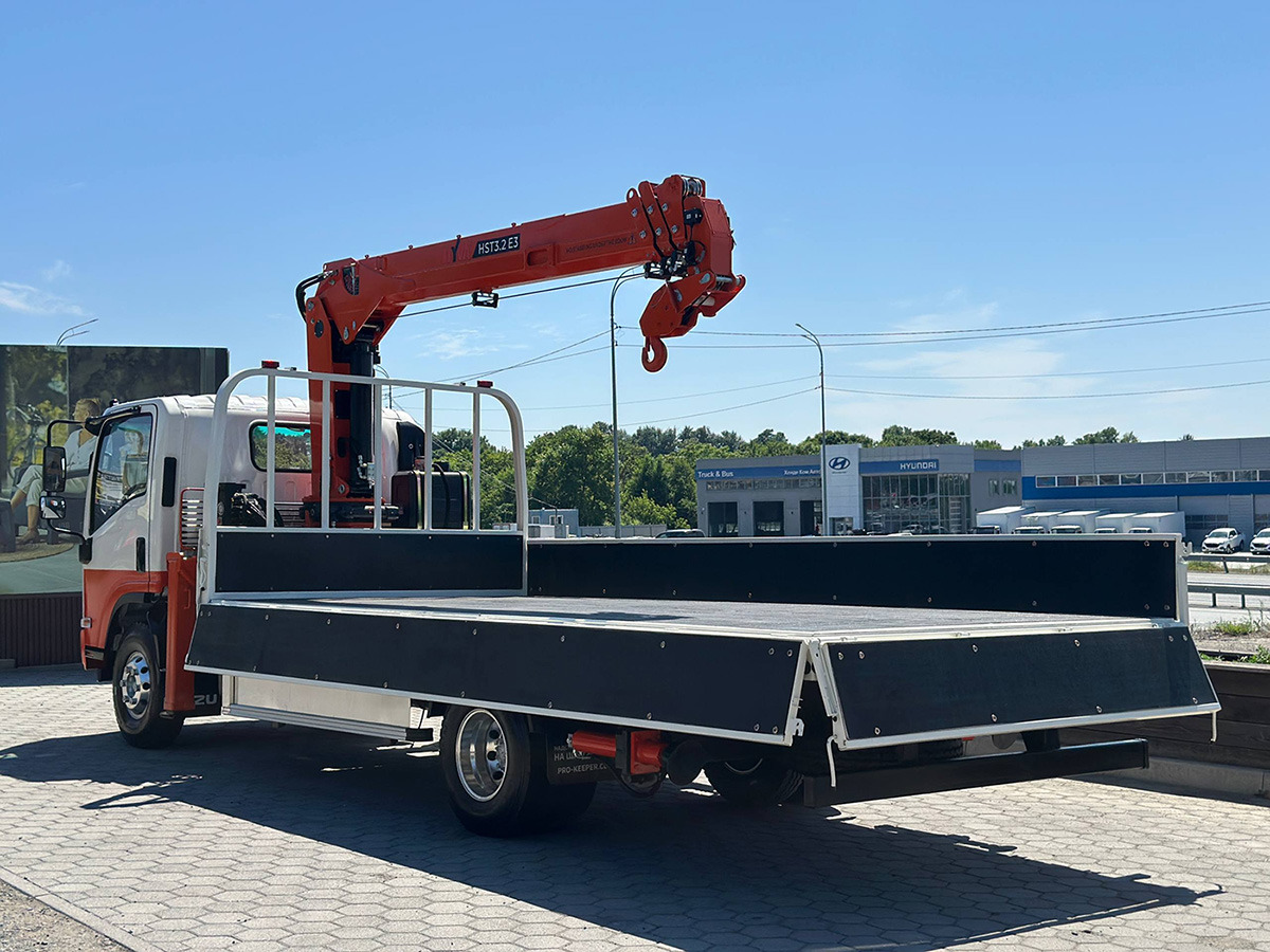 ISUZU ELF бортовой с КМУ HYVA - Бортовой грузовик/ Платформа, Автоманипулятор: фото 5 ISUZU ELF бортовой с КМУ HYVA - Бортовой грузовик/ Платформа, Автоманипулятор: фото 5