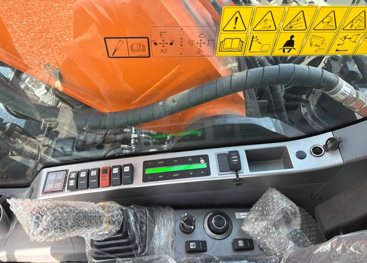 Новый Колёсный экскаватор Develon DX210W-7B: фото 13