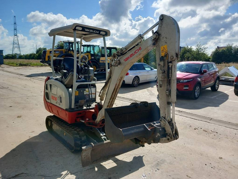 Takeuchi TB216 - Мини-экскаватор: фото 1 Takeuchi TB216 - Мини-экскаватор: фото 1