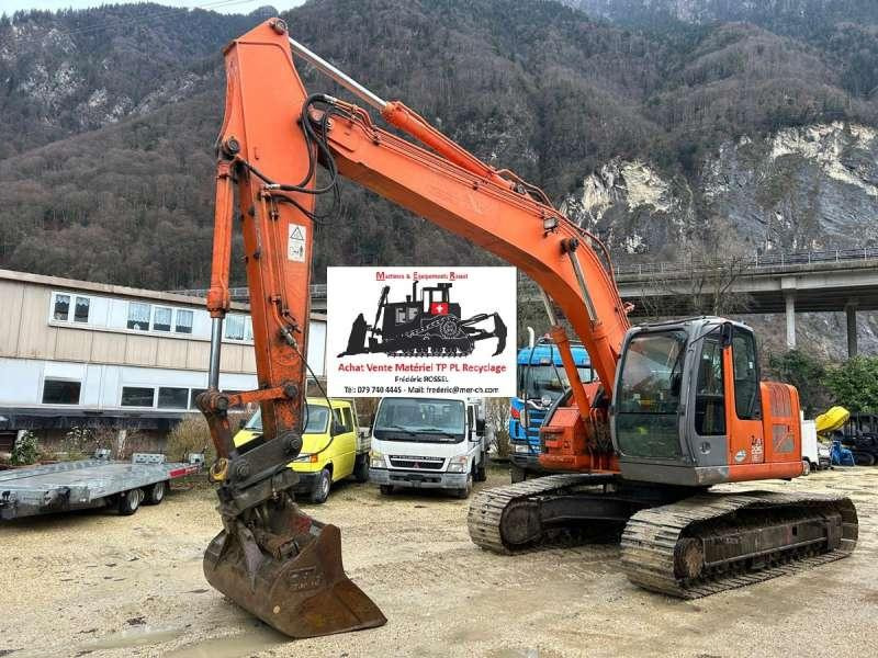 Hitachi ZX225US - Гусеничный экскаватор: фото 1 Hitachi ZX225US - Гусеничный экскаватор: фото 1