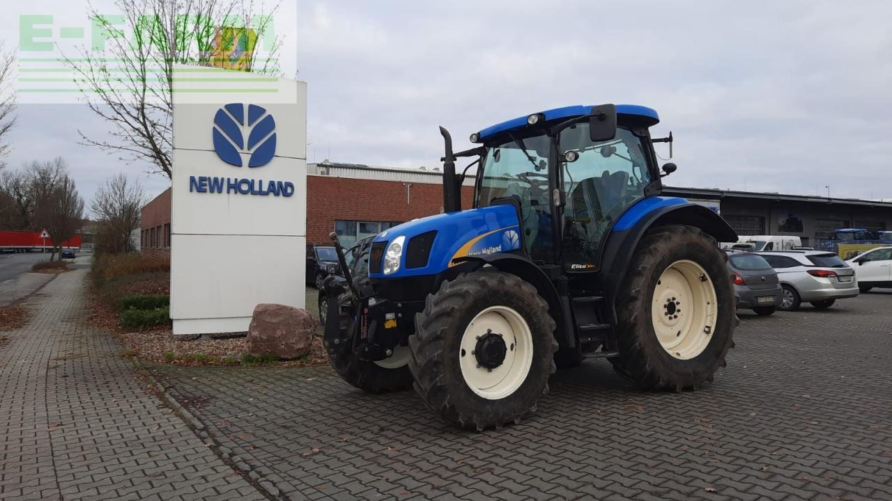 New Holland t6020 elite Elite - Трактор: фото 1 New Holland t6020 elite Elite - Трактор: фото 1