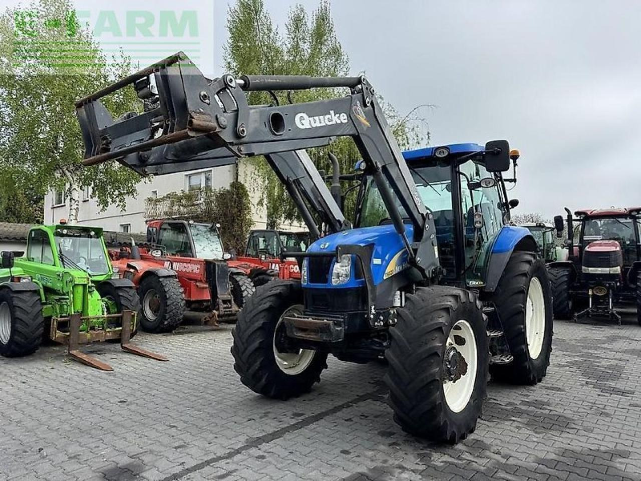 New Holland t6020 elite + quicke q55 Elite - Трактор: фото 2 New Holland t6020 elite + quicke q55 Elite - Трактор: фото 2