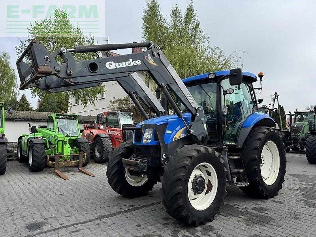 New Holland t6020 elite + quicke q55 Elite - Трактор: фото 1 New Holland t6020 elite + quicke q55 Elite - Трактор: фото 1