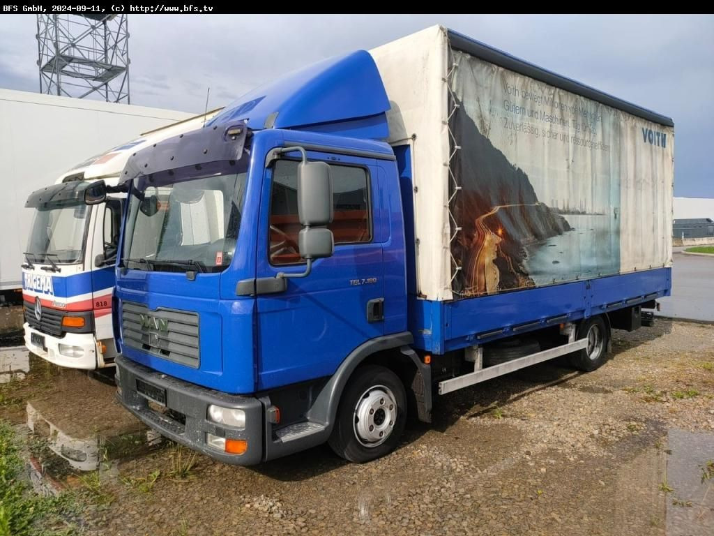 MAN TGL 7.180 4x2 BL - Тентованный фургон: фото 1 MAN TGL 7.180 4x2 BL - Тентованный фургон: фото 1