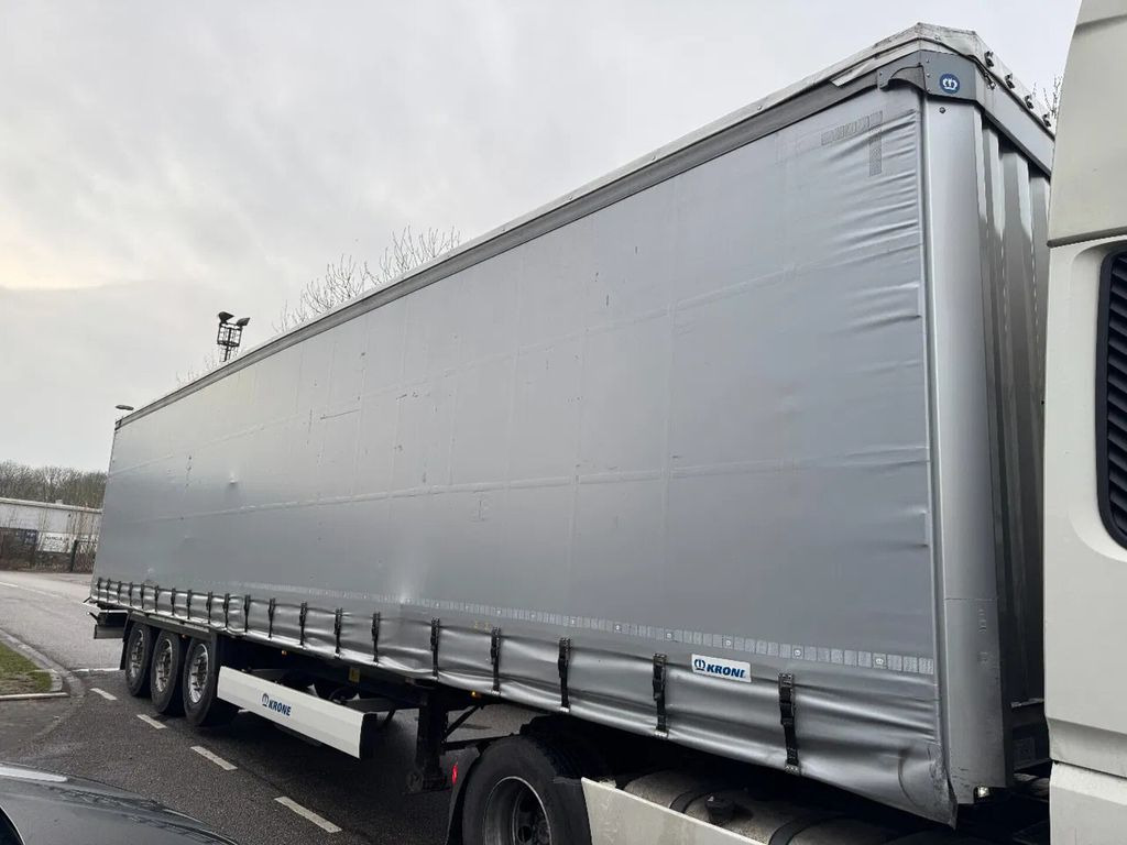 Krone SD - 3 AXLE + SLIDING ROOF - Тентованный полуприцеп: фото 1 Krone SD - 3 AXLE + SLIDING ROOF - Тентованный полуприцеп: фото 1