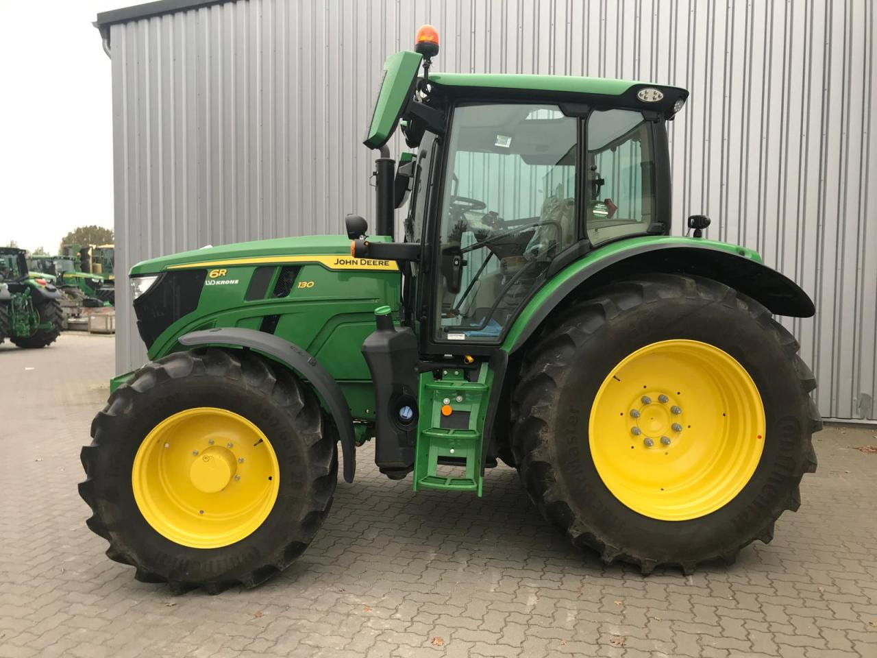 John Deere 6R 130 - Трактор: фото 1 John Deere 6R 130 - Трактор: фото 1