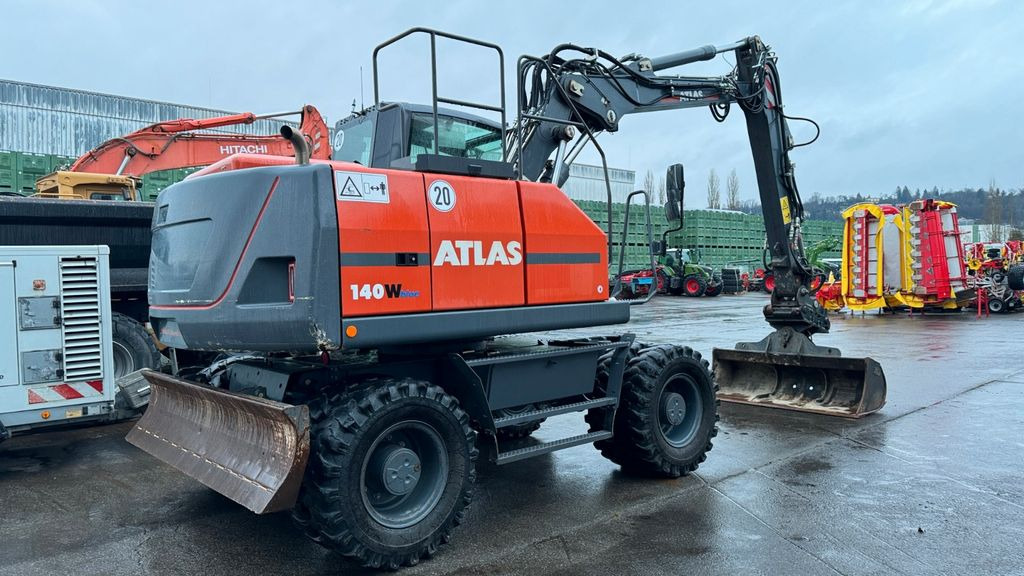 Atlas 140 W Oilquick 65 SH, 2 meter hydr .GBR - Колёсный экскаватор: фото 1 Atlas 140 W Oilquick 65 SH, 2 meter hydr .GBR - Колёсный экскаватор: фото 1