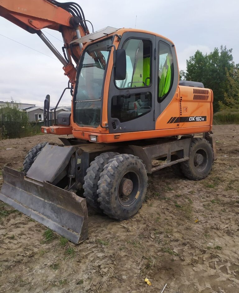 Doosan DX160 w - Колёсный экскаватор: фото 1