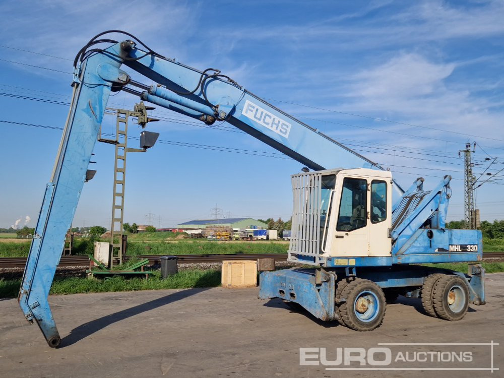 Fuchs MHL 330 - Колёсный экскаватор: фото 1 Fuchs MHL 330 - Колёсный экскаватор: фото 1