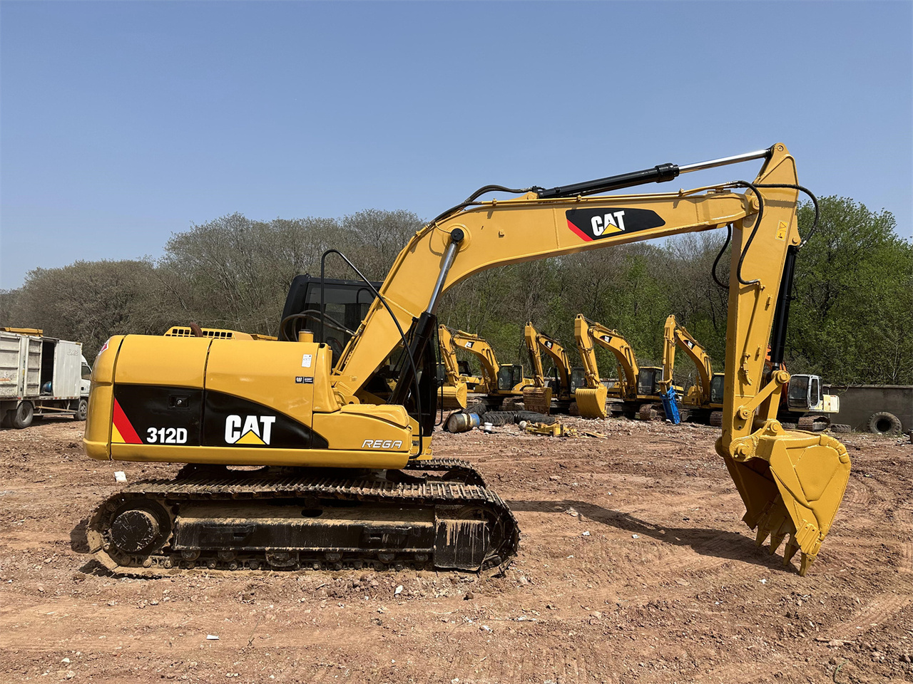 Caterpillar 312D - Мини-экскаватор: фото 1 Caterpillar 312D - Мини-экскаватор: фото 1
