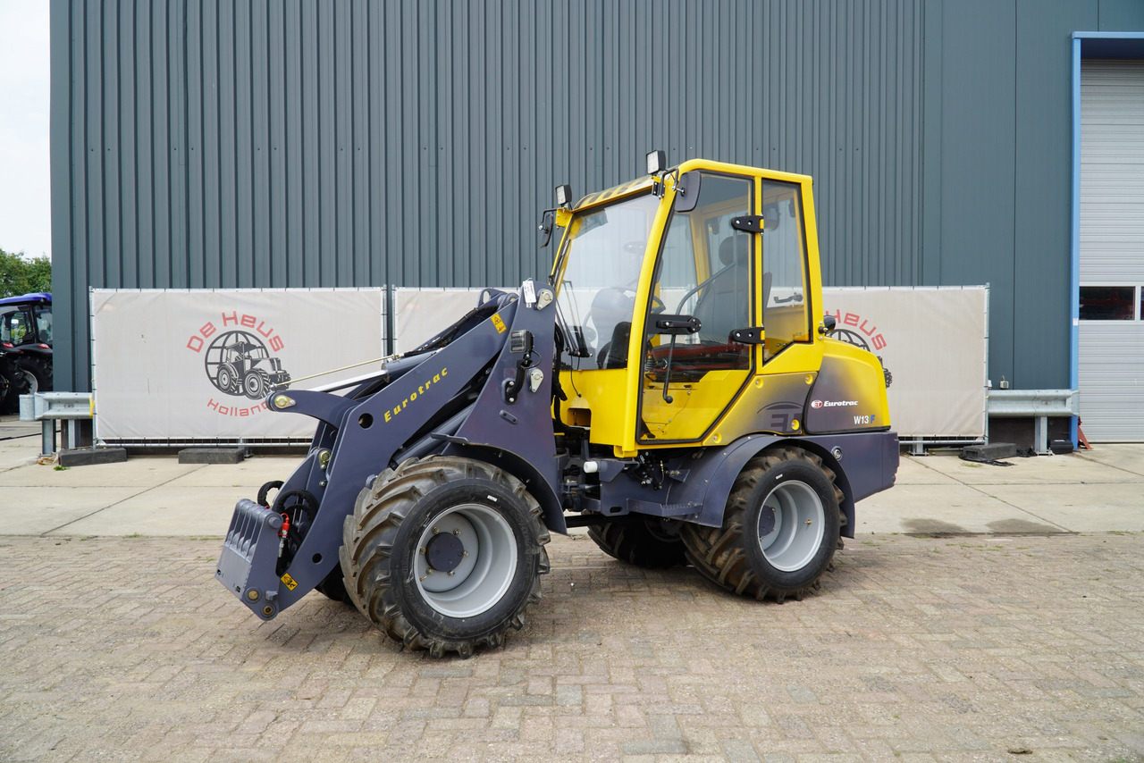 Eurotrac W13 Radlader Hoflader - Компактный фронтальный погрузчик: фото 1 Eurotrac W13 Radlader Hoflader - Компактный фронтальный погрузчик: фото 1