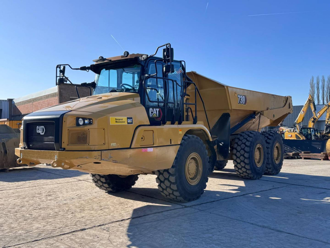 CAT 730-04 - Сочленённый самосвал: фото 1
